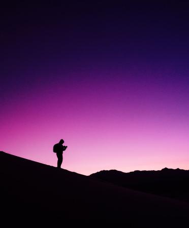 Silhouette of a person in a mountains