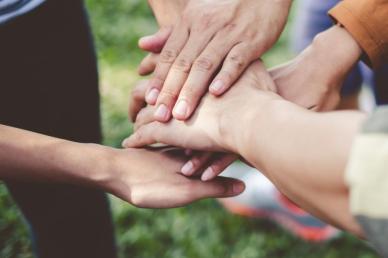 A group of people holding hands