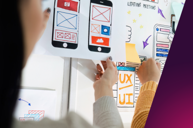 A poster board of UX design with people pointing at it