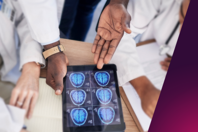 a picture of doctors looking at a brain scan 