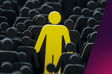 A picture of a single yellow stickman and several other black stickmen to signify difference