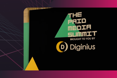 The Paid Media Summit event signage with Diginius branding on a black background
