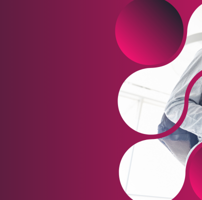 Smiling professionals carrying notebooks and coffee cups, walking together through a modern office space with a magenta geometric overlay design