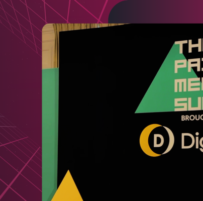 The Paid Media Summit event signage with Diginius branding on a black background