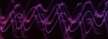 Blue wave on a black background by Pawel Czerwinski (Unsplash)