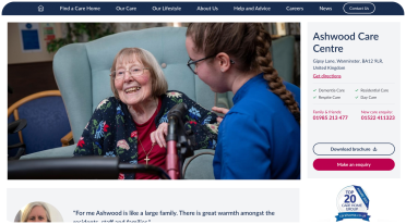 Ashwood Care Centre – Compassionate Residential and Dementia Care Care worker smiling and chatting with an elderly woman at Ashwood Care Centre